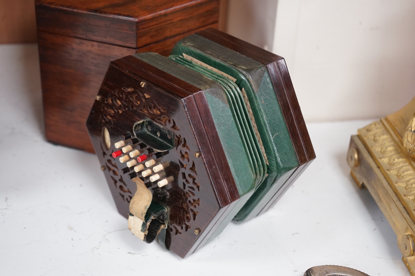 A Wheatstone concertina, in rosewood case, case 16.5cm high. CITES Submission reference, PS7AQEEA